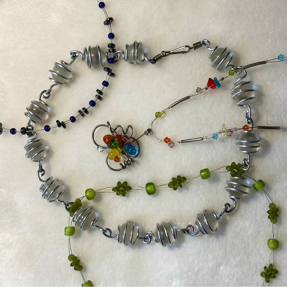 Four Y2K necklaces